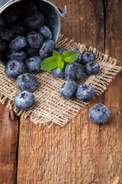 Blueberry on wooden table.