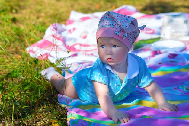 Blueeyed girl on a picnic