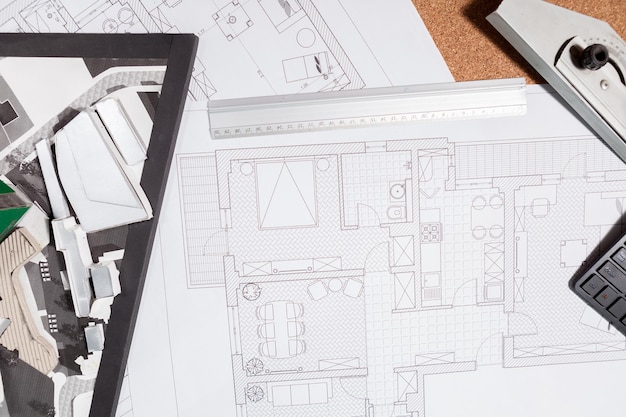 Blueprints on an architect table. House project and drawing