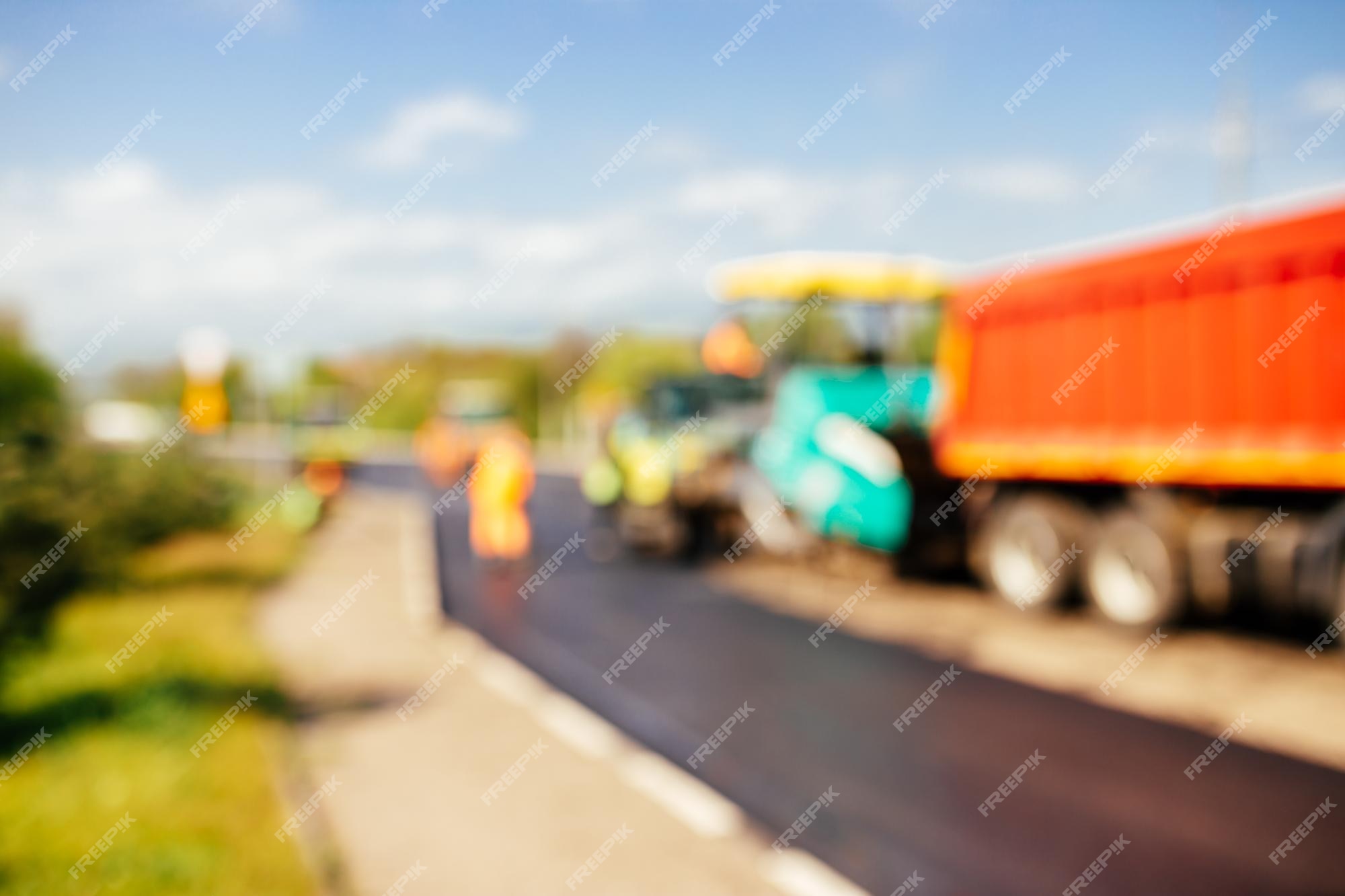 Premium Photo | Blur background of construction site is laying new asphalt  road pavementroad construction workers