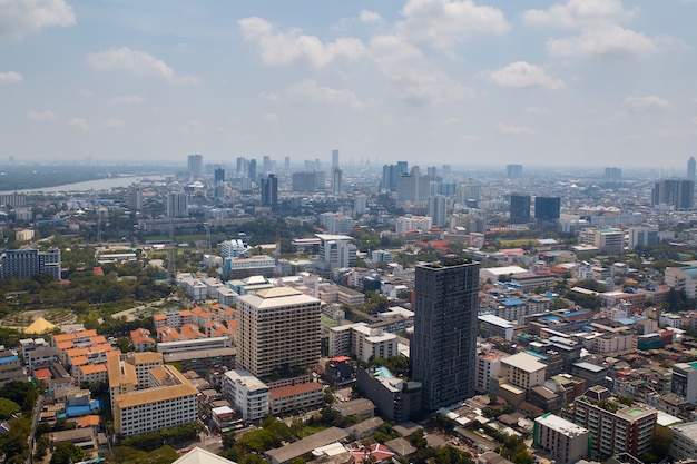 Blur background of morning gold light view over cityscape Bangkok