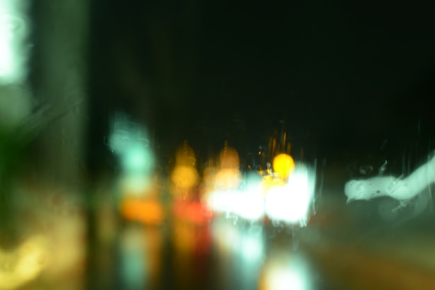blur from the lights of cars on the road at night