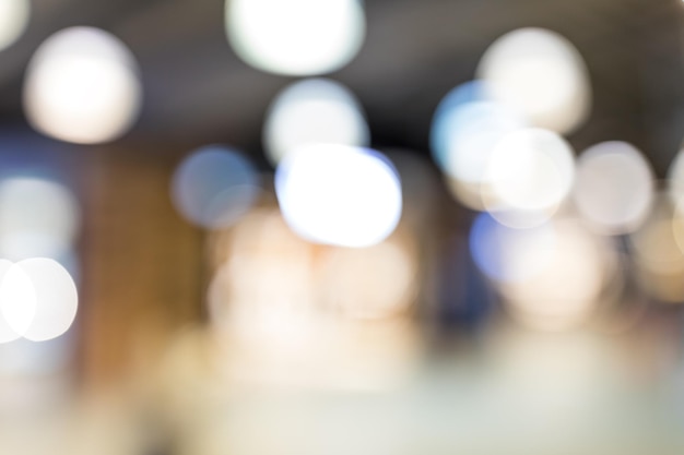 Blur image of tourists walk in night market