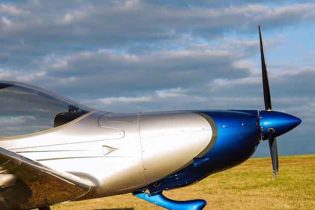 Blur light small plane on a grass field o