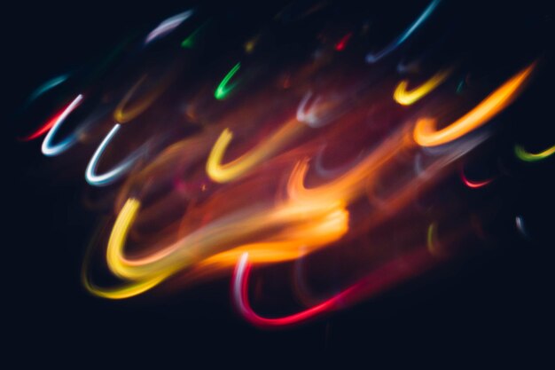 Photo blur party lights neon multicolor curvy lines dark