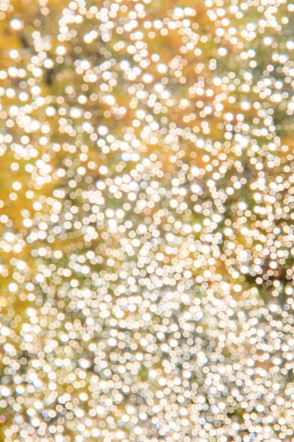 Photo blured to shiny circles like garland rain drops on autumn window after a heavy rain