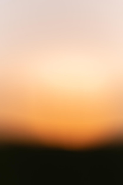 Blurred background image in orange and yellow gradient