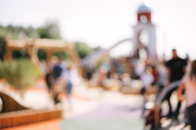 Blurred background of playground in park on summer day. High quality photo