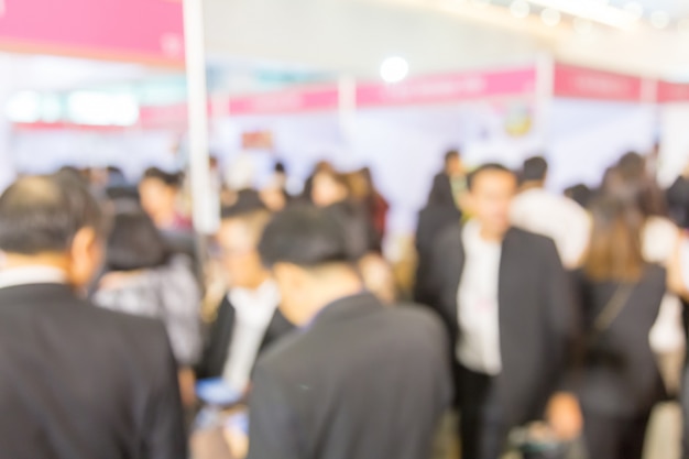 Blurred background of  public exhibition hall. Business trade show, job fair, or stock market. 