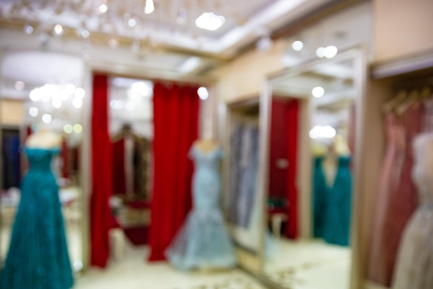 Photo blurred background shop of wedding and evening dresses