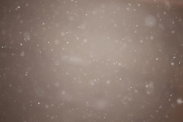 ぼやけた背景降雪の性質、抽象的な降雪片のデザイン