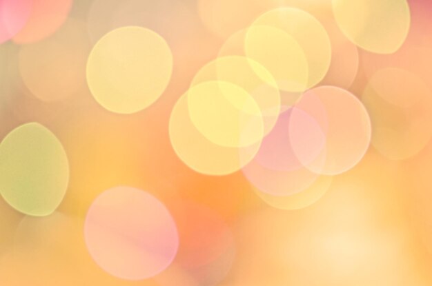 Blurred background sunset with bokeh sun light Yellow bokeh background Abstract blur golden bokeh lighting