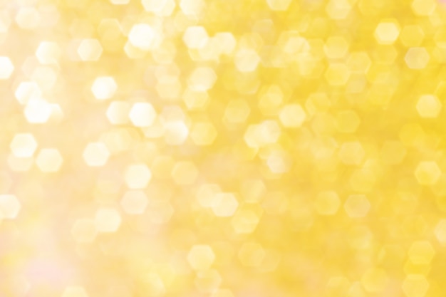 Blurred background with golden sparkles. 