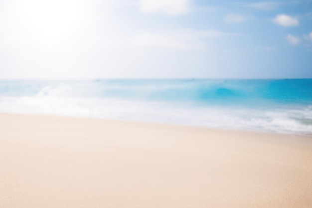 Blurred beach background with sunrays summer sandy empty beach