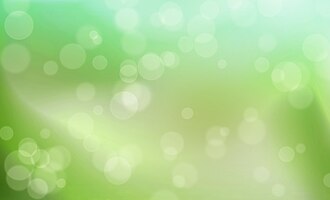 Blurred bokeh circles on green nature background texture for spring wallpaper
