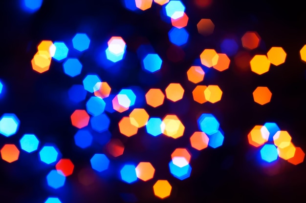 Blurred bokeh light background, Christmas and New Year holidays background.