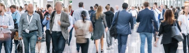 Blurred business people at a trade fair