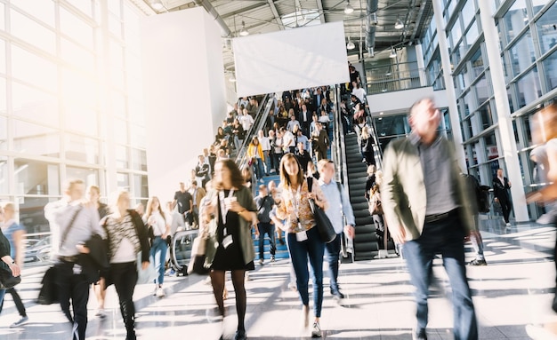 blurred business people at a trade fair