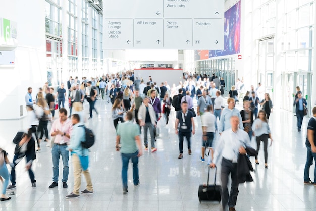 Blurred business people at a trade fair