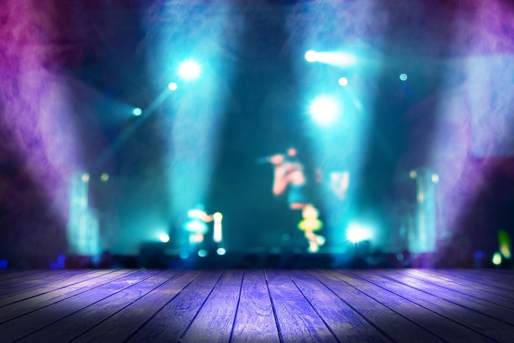Photo blurred concert lighting and bokeh on stage with wooden floor