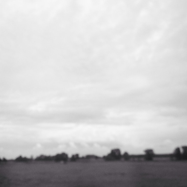 Photo blurred countryside landscape against sky