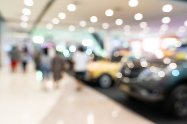 Blurred dealership store, with the cars and soft lightning