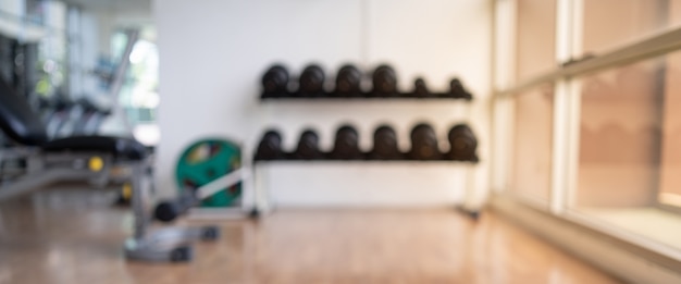 Blurred of fitness gym background for banner fitness exercise concept