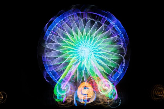 Blurred giant wheel ferris at night