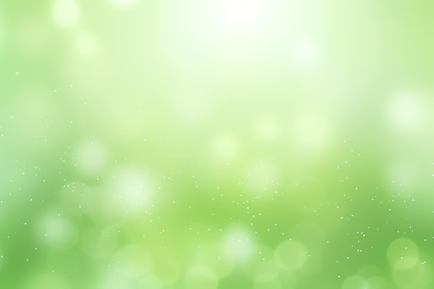 A blurred green background with white dots