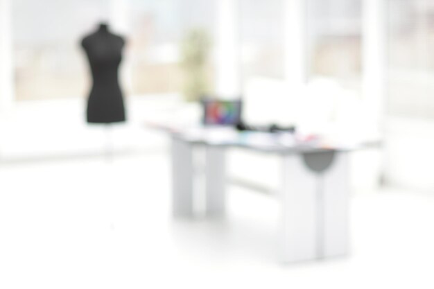 Blurred image Atelier of designer clothes photo with copy space