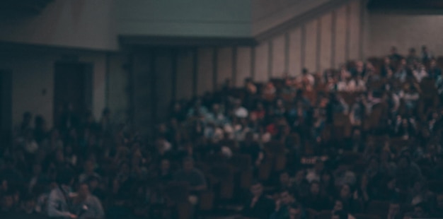 Photo blurred image of the audience in the conference room. business and education