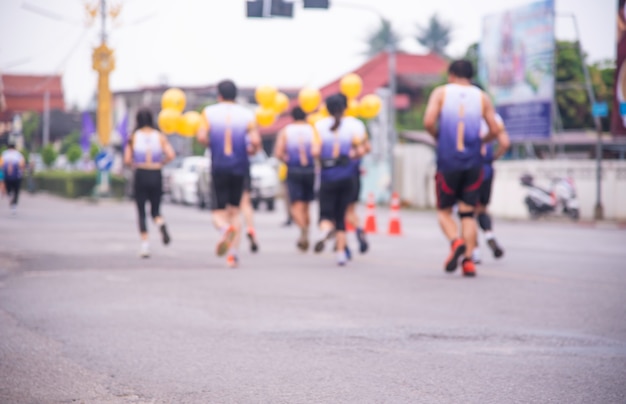 Blurred image behind the runner.