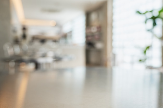 Photo blurred image of a table in modern cafe