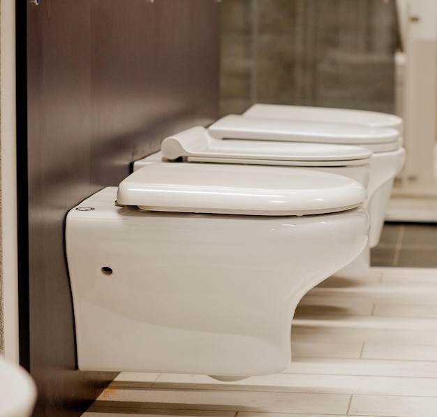 Blurred image of toilet bowls aisle in a hardware store