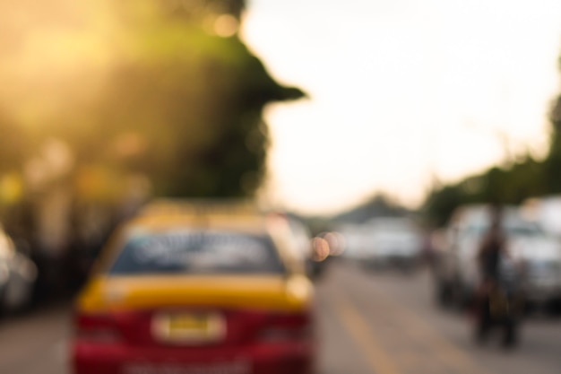 Blurred image of traffic on a road full of cars.