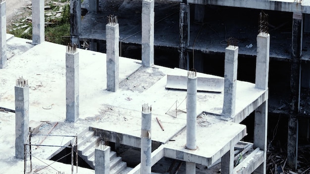 Blurred images of abandoned old dirty building or tower which unfinished construction because of