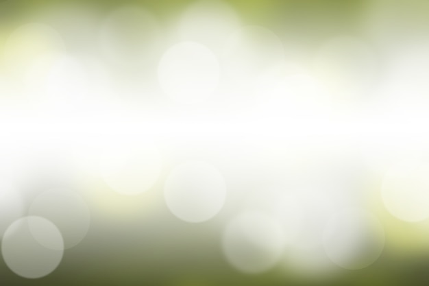 Fondo verde vago dell'estratto del bokeh di pendenza di verde