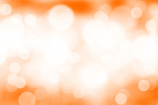 Blurred light orange gradient bokeh abstract background