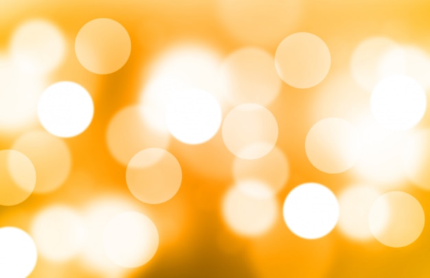 Photo blurred light yellow or gold gradient bokeh abstract background