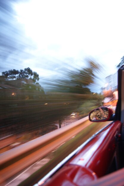 Photo blurred motion of car on road