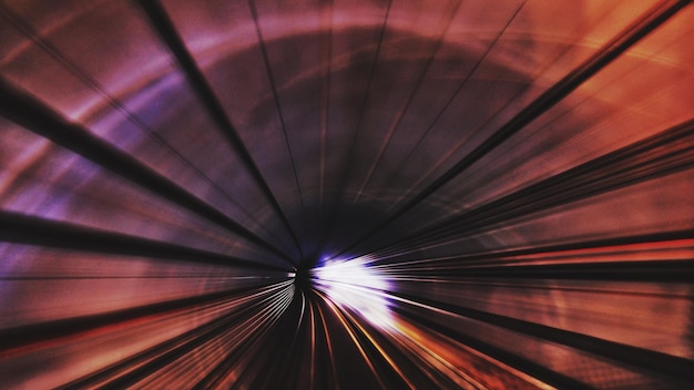 Photo blurred motion of illuminated tunnel