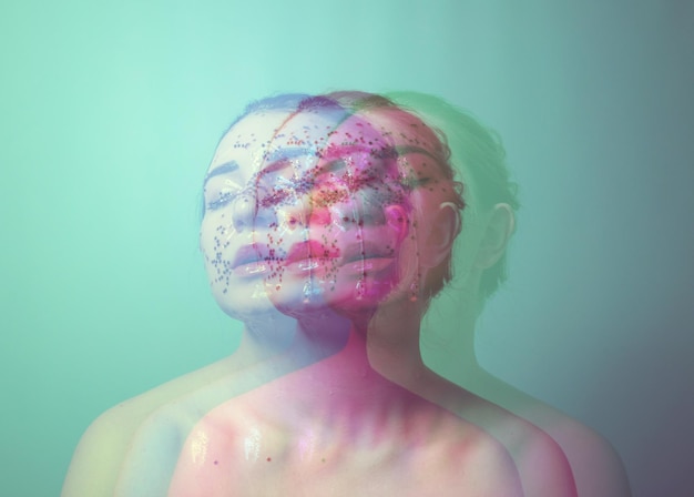 blurred motion of shirtless young woman with beauty product on face against turquoise background