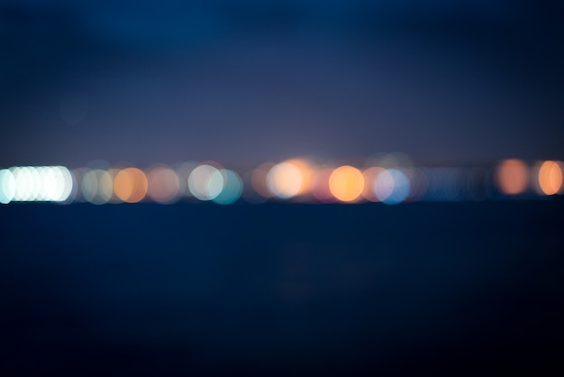 Blurred night city lights horizon