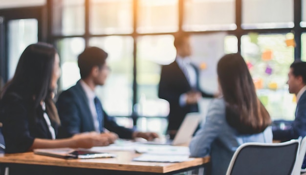 Photo blurred office meeting businesspeople in boardroom discussing representing collaboration and corpo