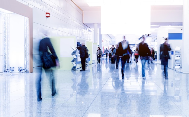 Blurred people at a trade fair