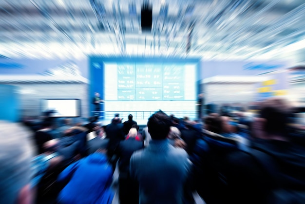 Blurred people at a trade fair