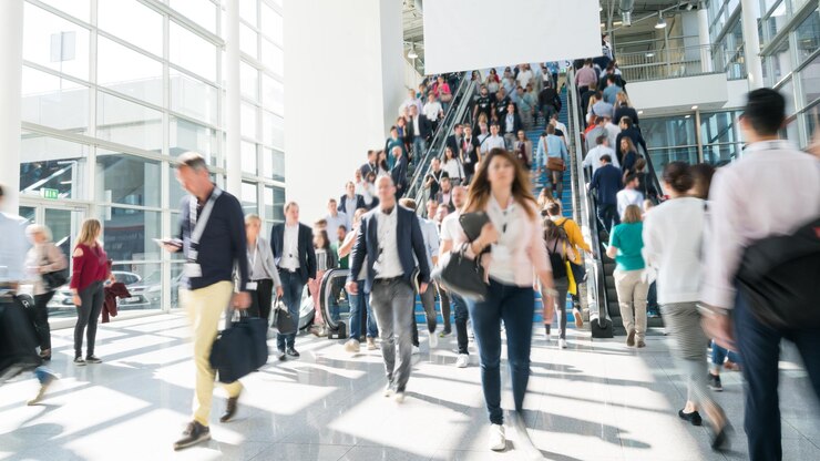 Blurred people at a trade fair