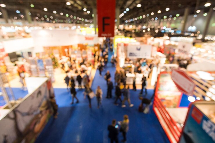 Blurred people at a trade fair