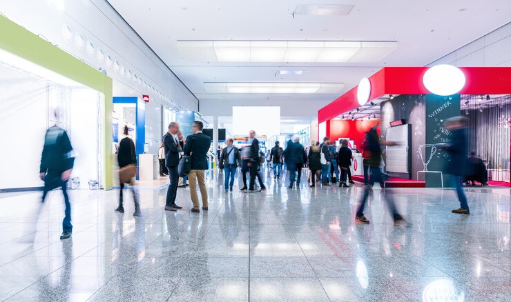 Blurred people at a trade fair