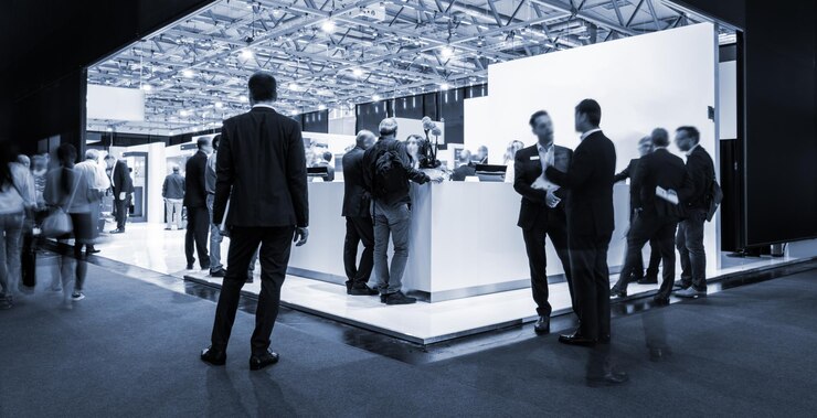 Blurred people at a trade fair